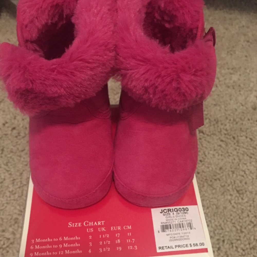 Brand new Juicy pink boots. Never been worn